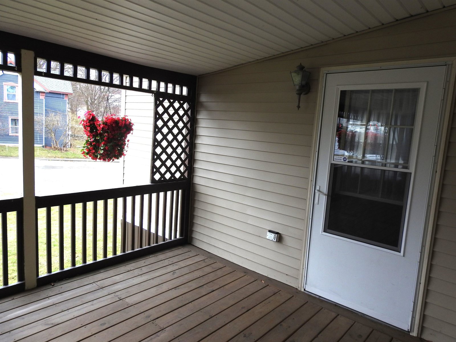 Covered porch with door to Bedroom 3