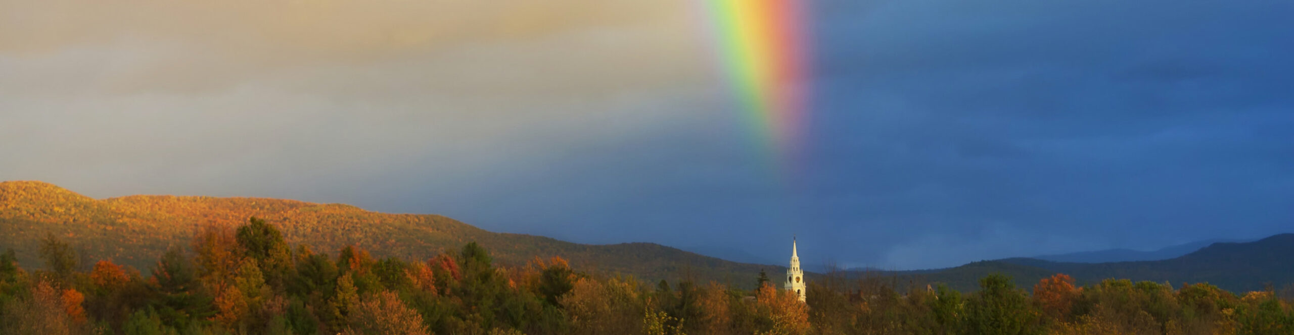 Rainbow over Church Steeple in Middlebury Middlebury Rainbow over Church 1 scaled