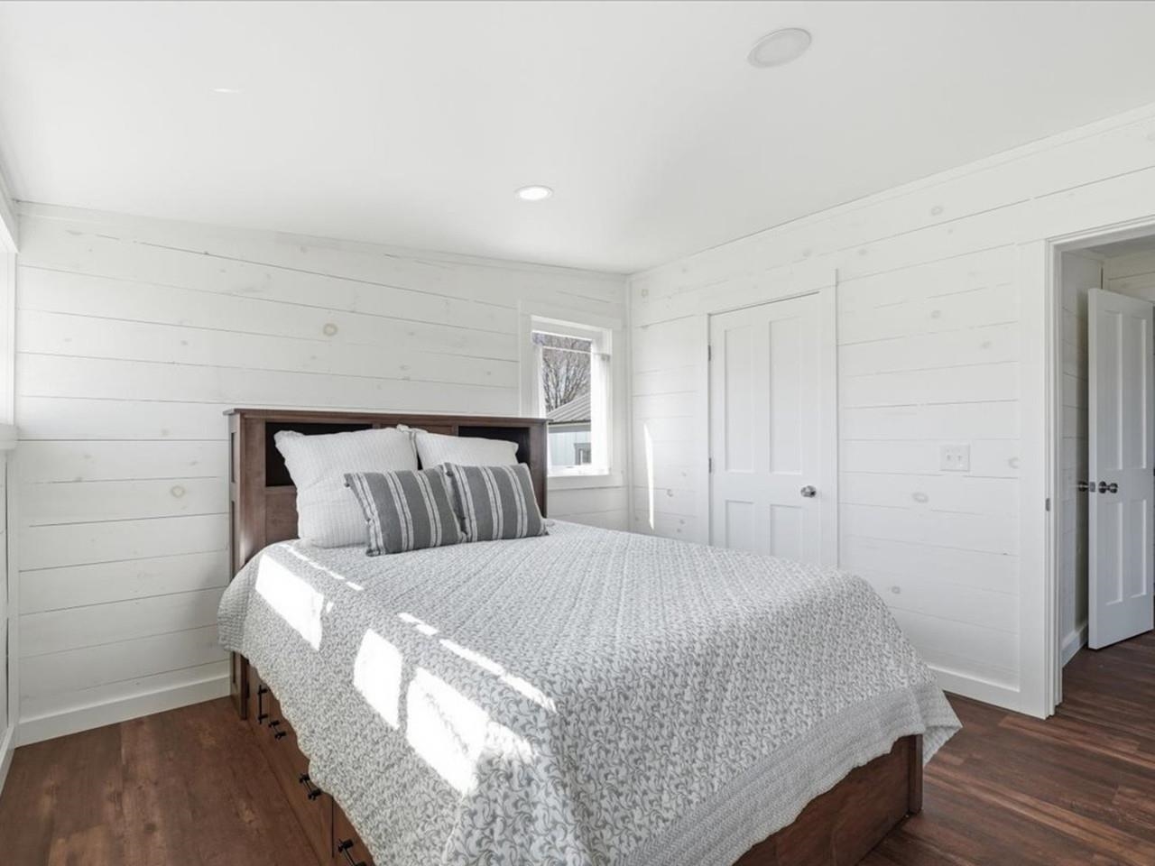 Bedroom with stylish shiplap
