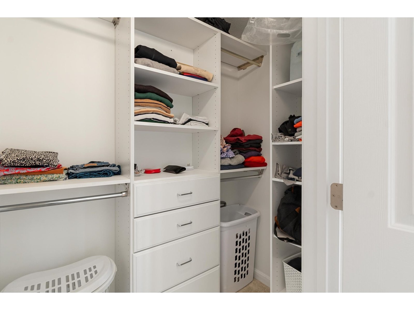 primary bedroom walk-in closet