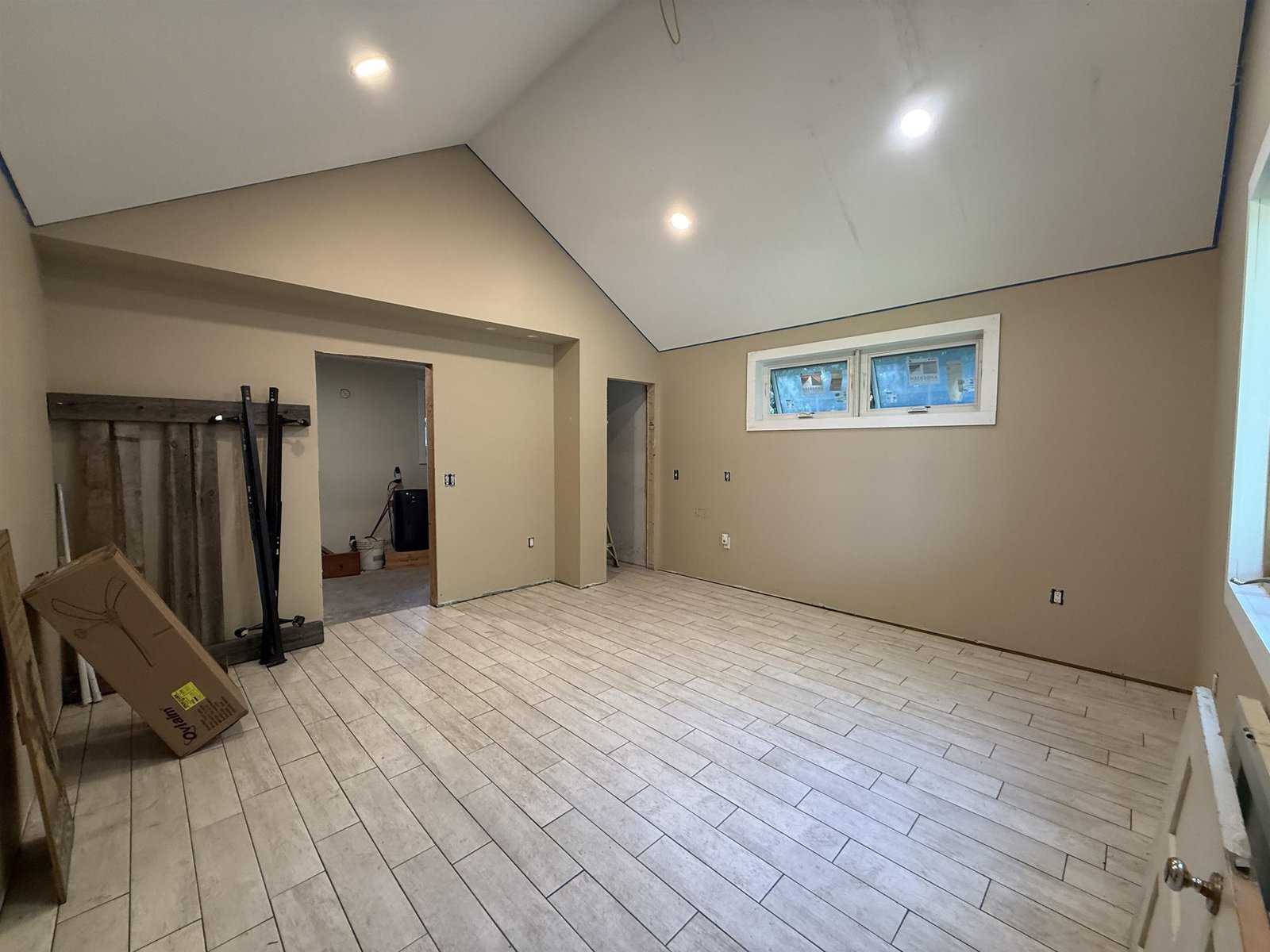 Large partially finished additional Primary bedroom with en-suite bath