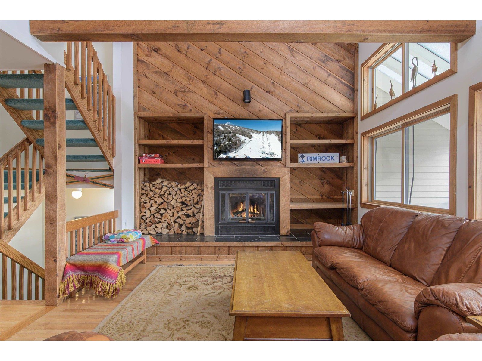 Woodburning fireplace is the centerpiece of the great room