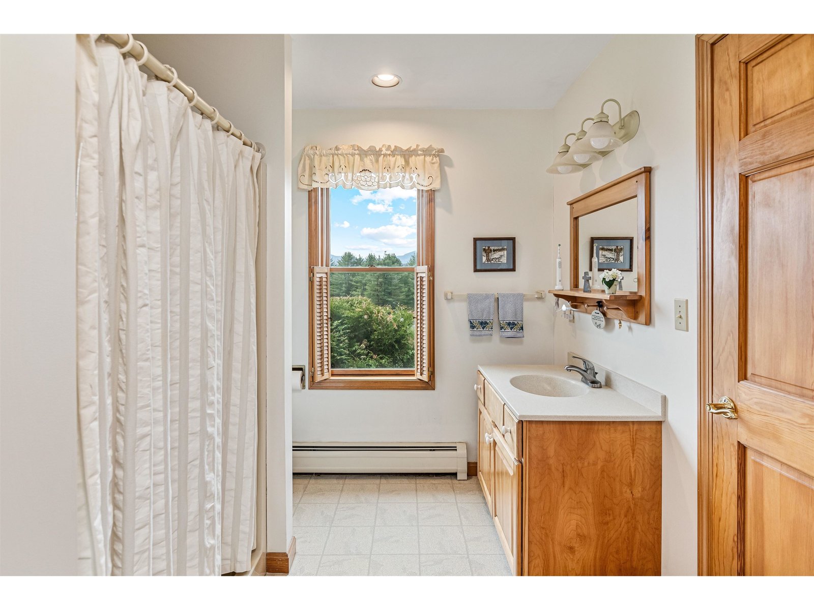 3/4 bath located off first floor bedroom