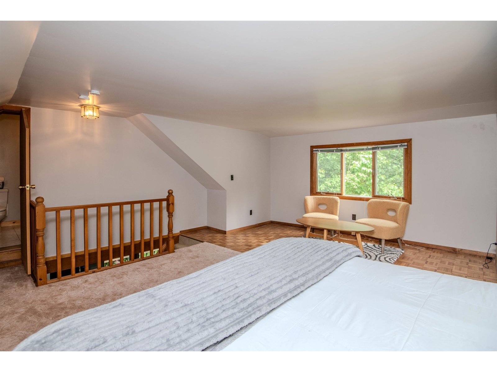 Private primary bedroom suite occupies entire top floor