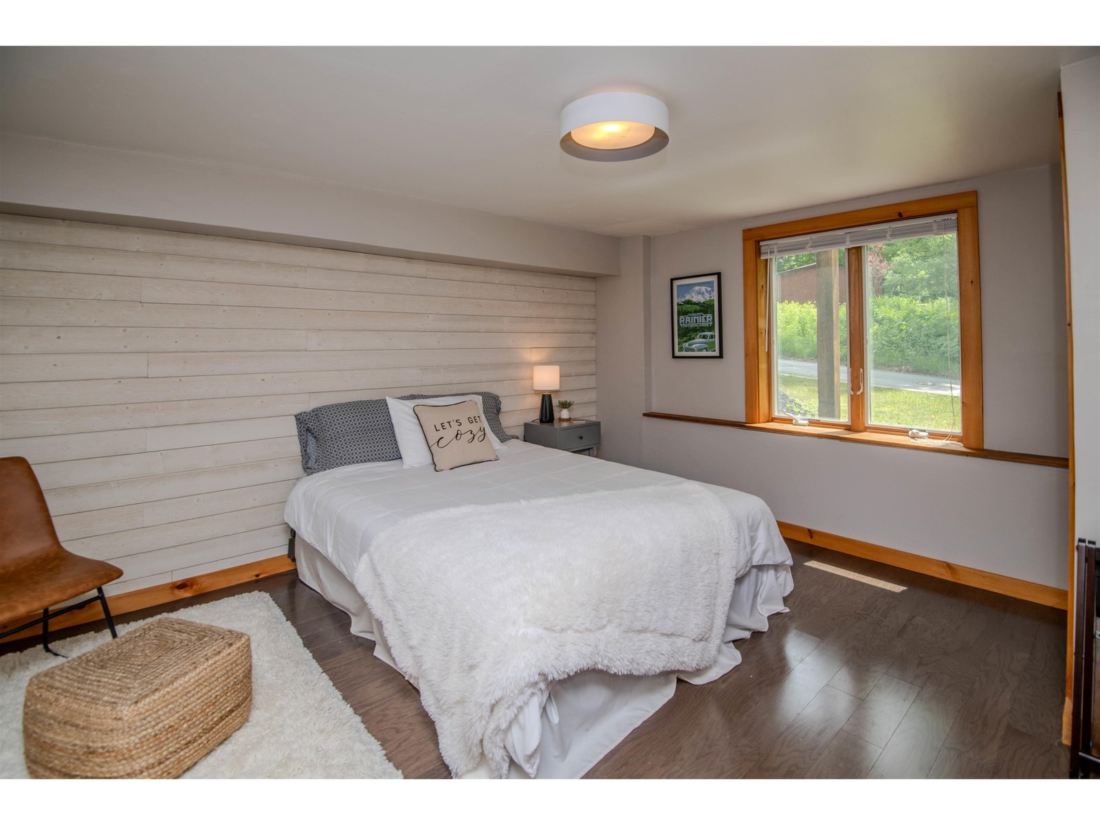Large guest bedroom with wall accents