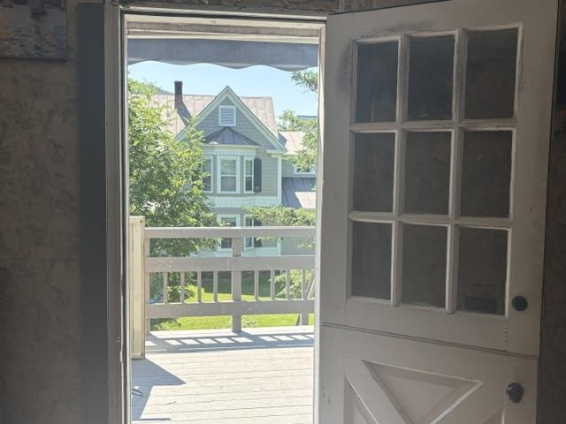 Doorway to 2nd floor apartment 's balcony