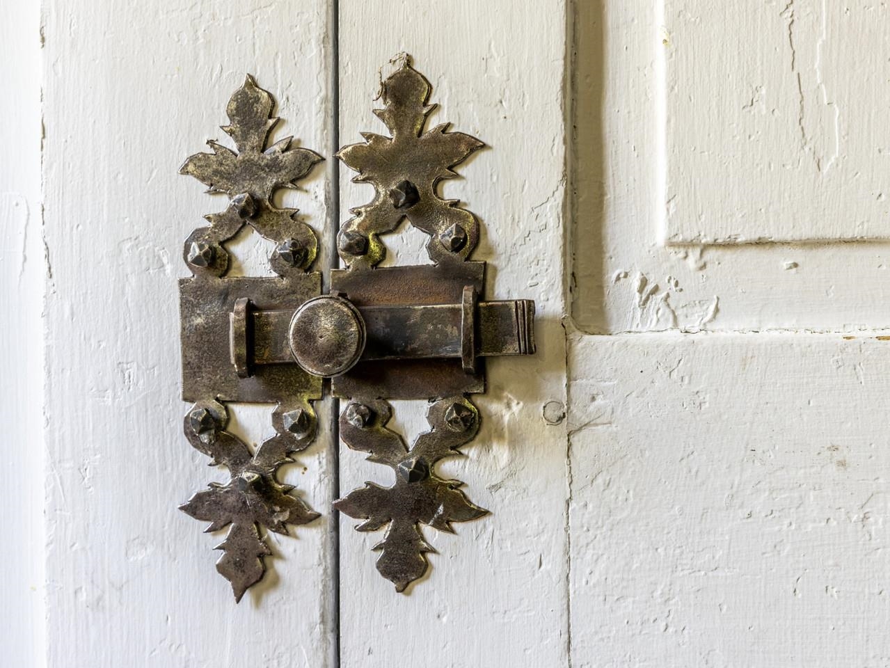 Ornate vintage door latch
