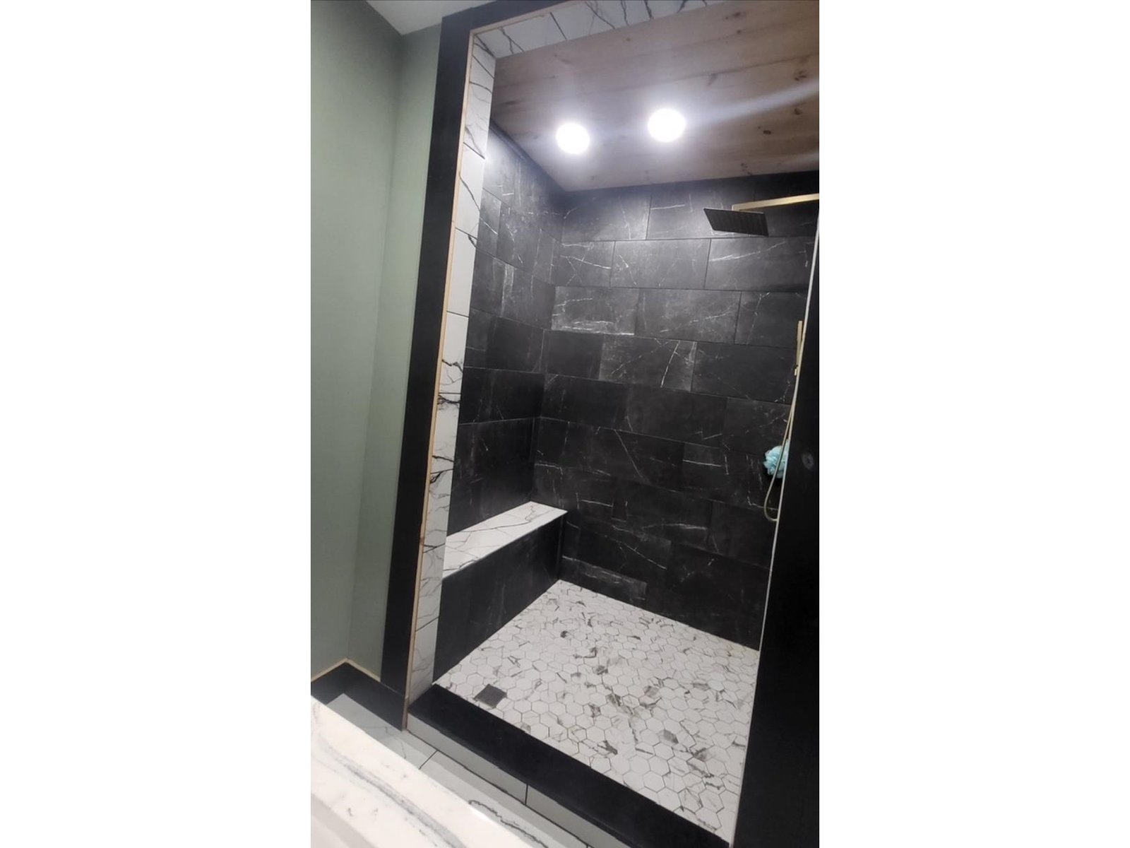Hand crafted shower in primary