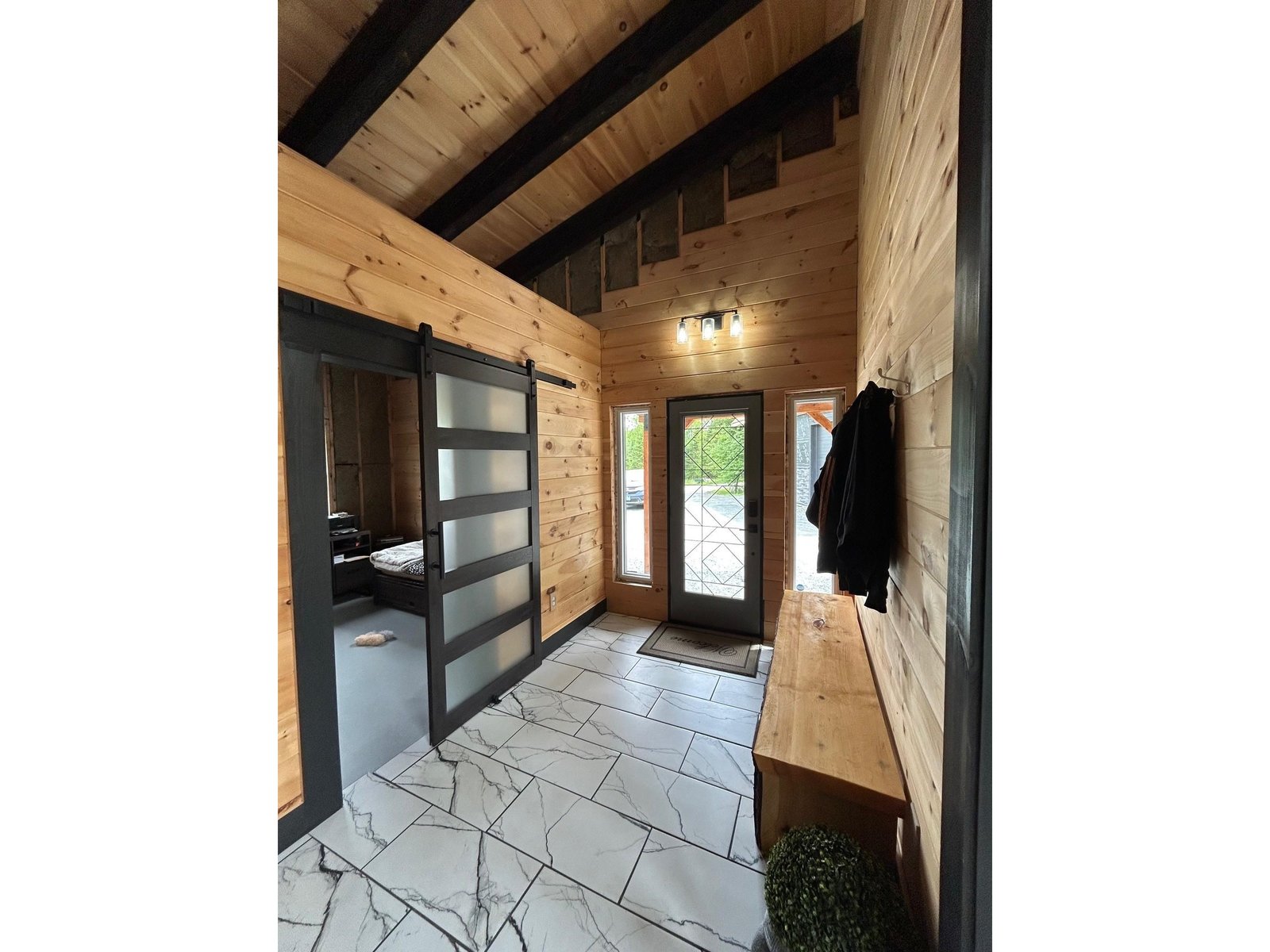 Entry to home with Bedroom 2 to LEFT