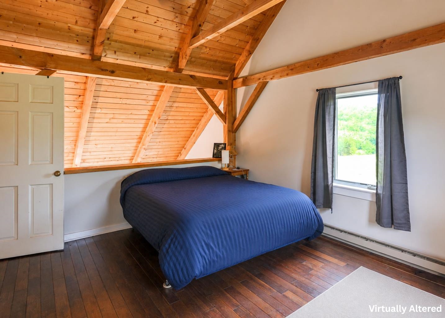Primary bedroom overlooks lower level