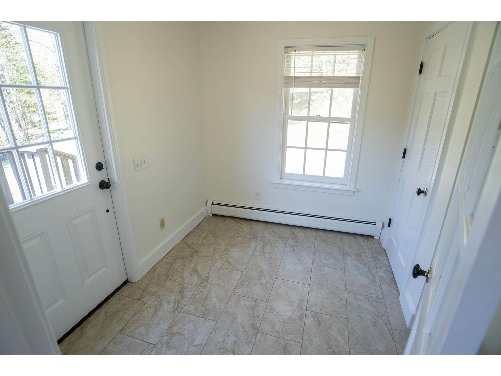 Tiled Mudroom with Closet
