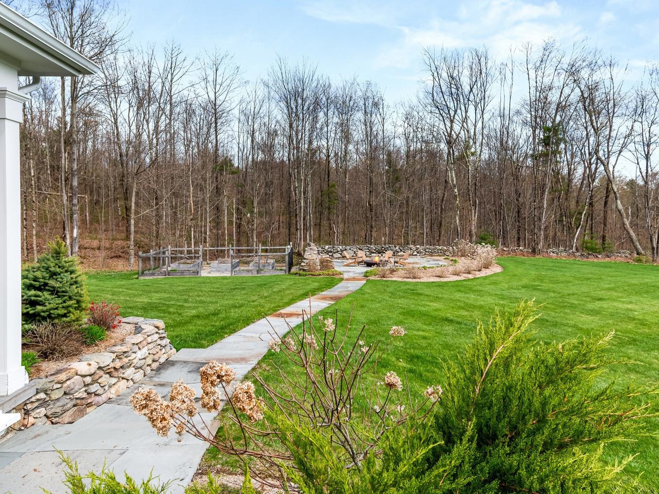 Leads to garden boxes/fire pit
