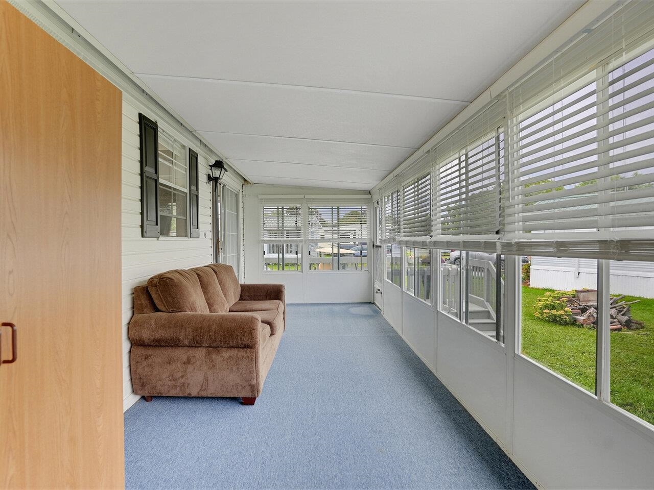 New blinds throughout sunroom