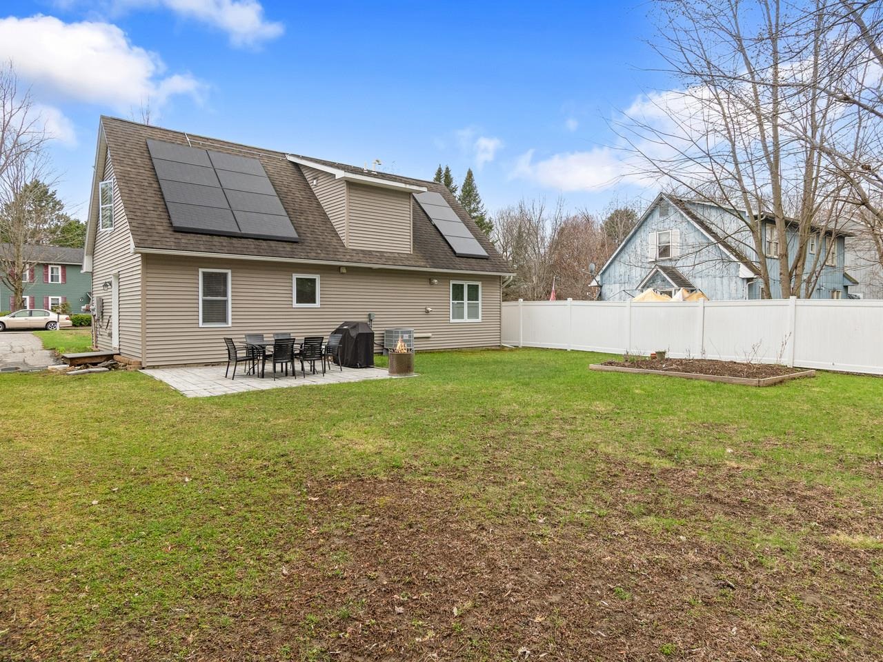 Backyard with solar & patio