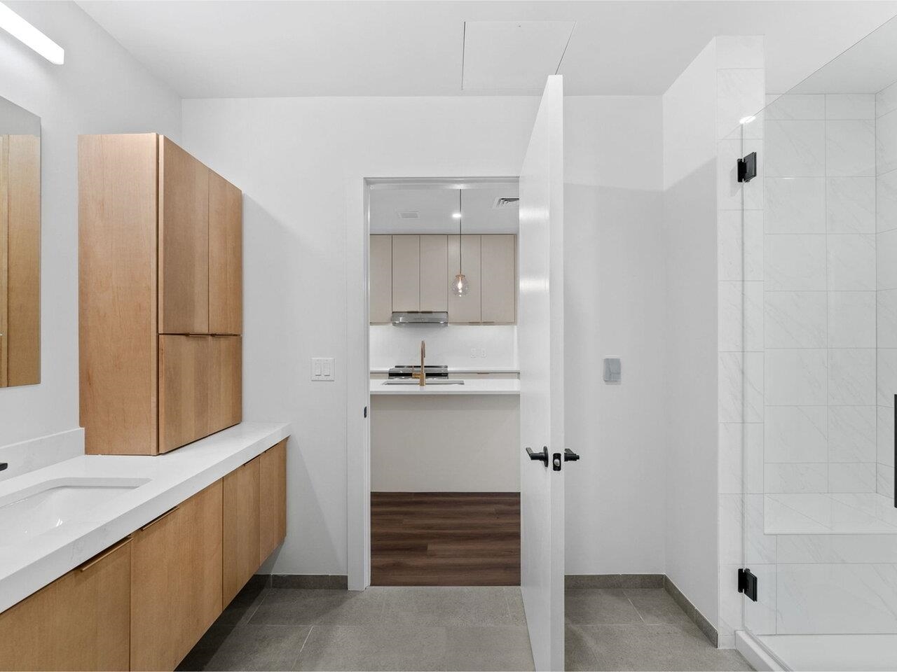 3/4 bathroom looks to kitchen