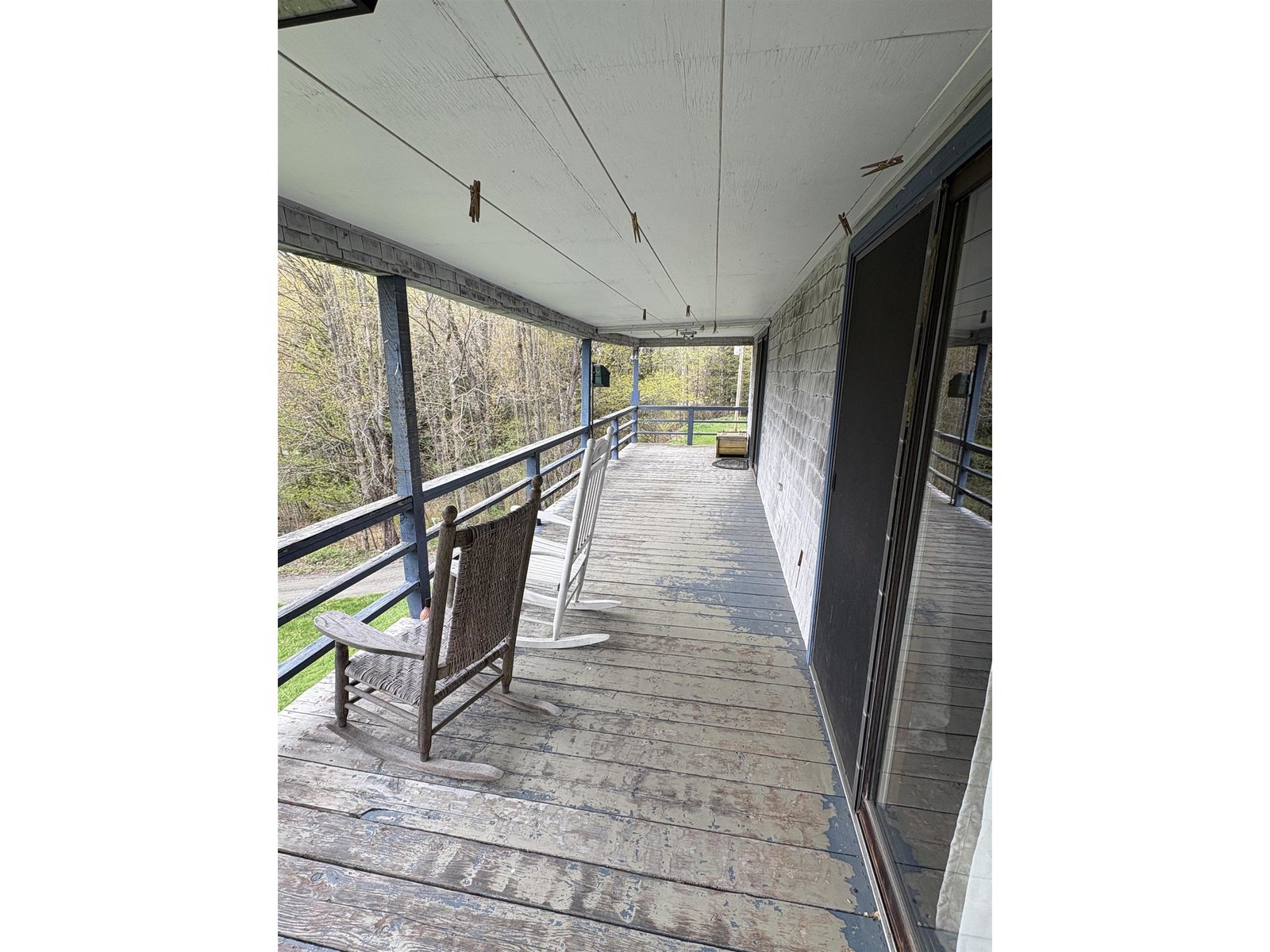 deck off LR and bedroom - entire front of house