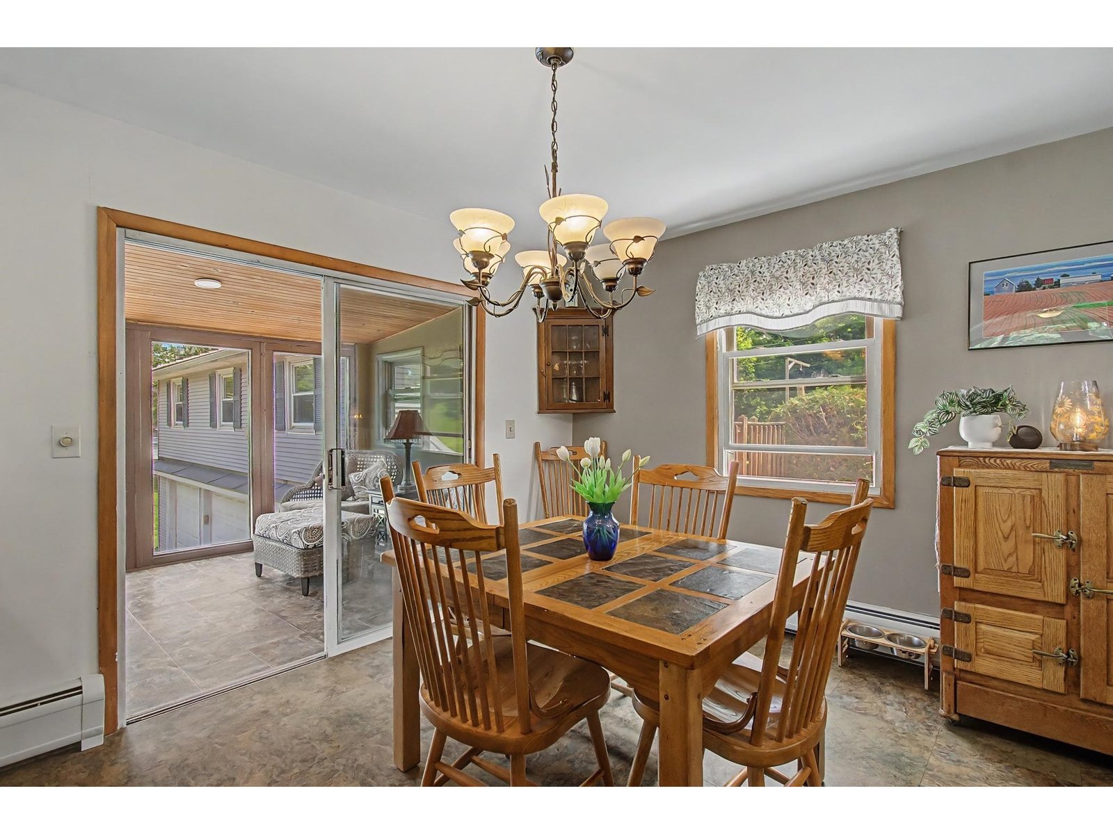 Dining Area looking into 3 season porch