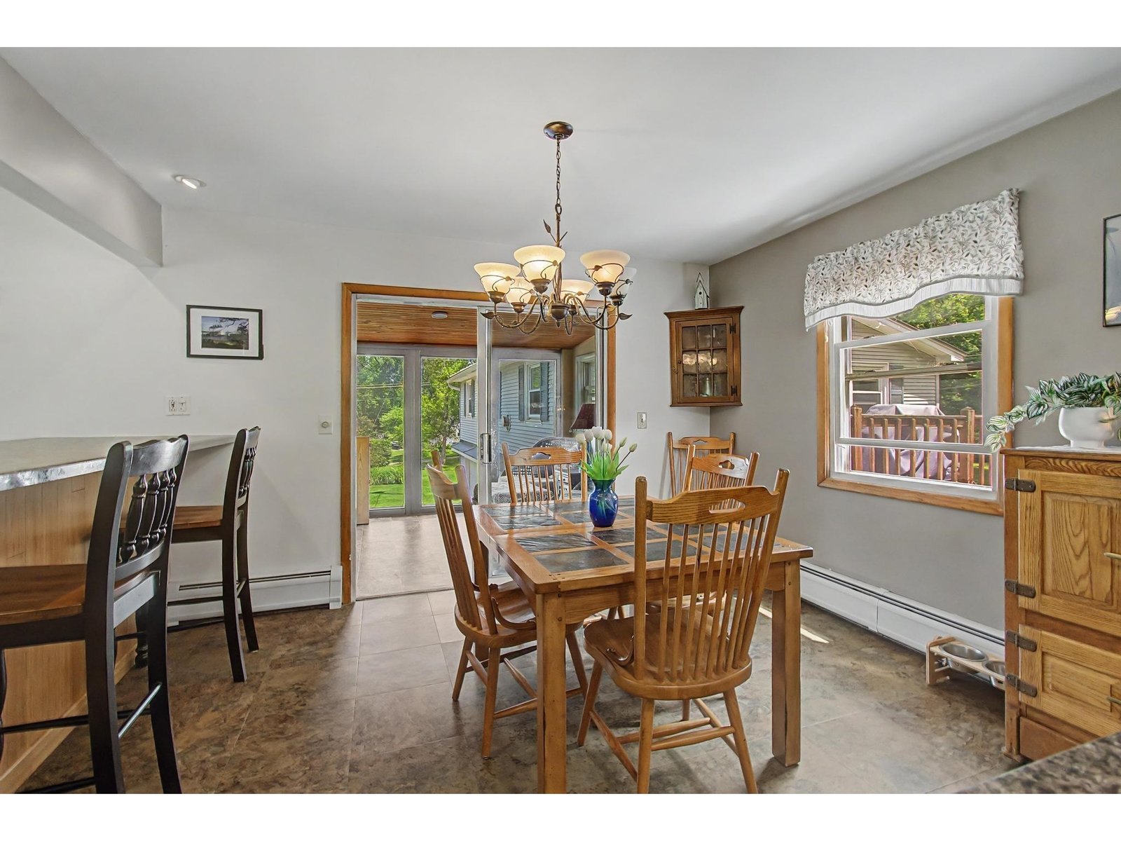 Dining Area looking into 3 season porch