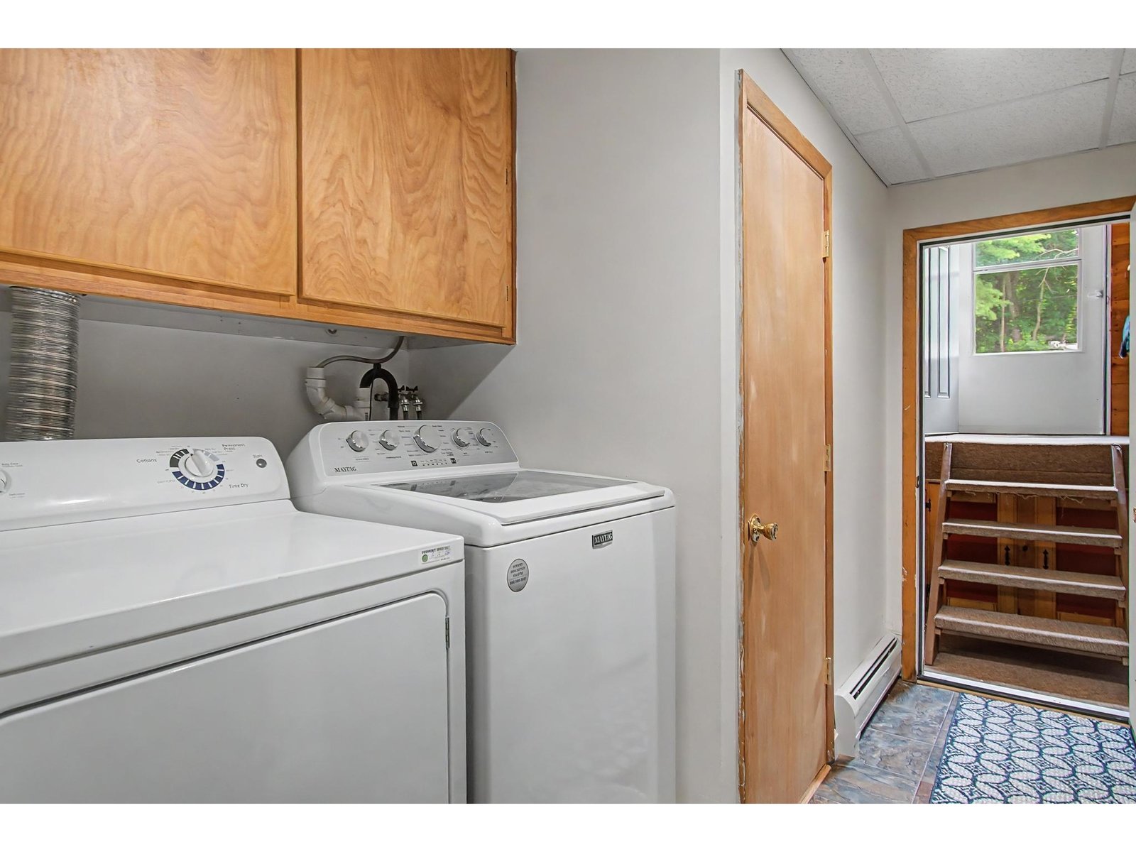 Laundry Room, 1/2 Bath, Stairs to backyard