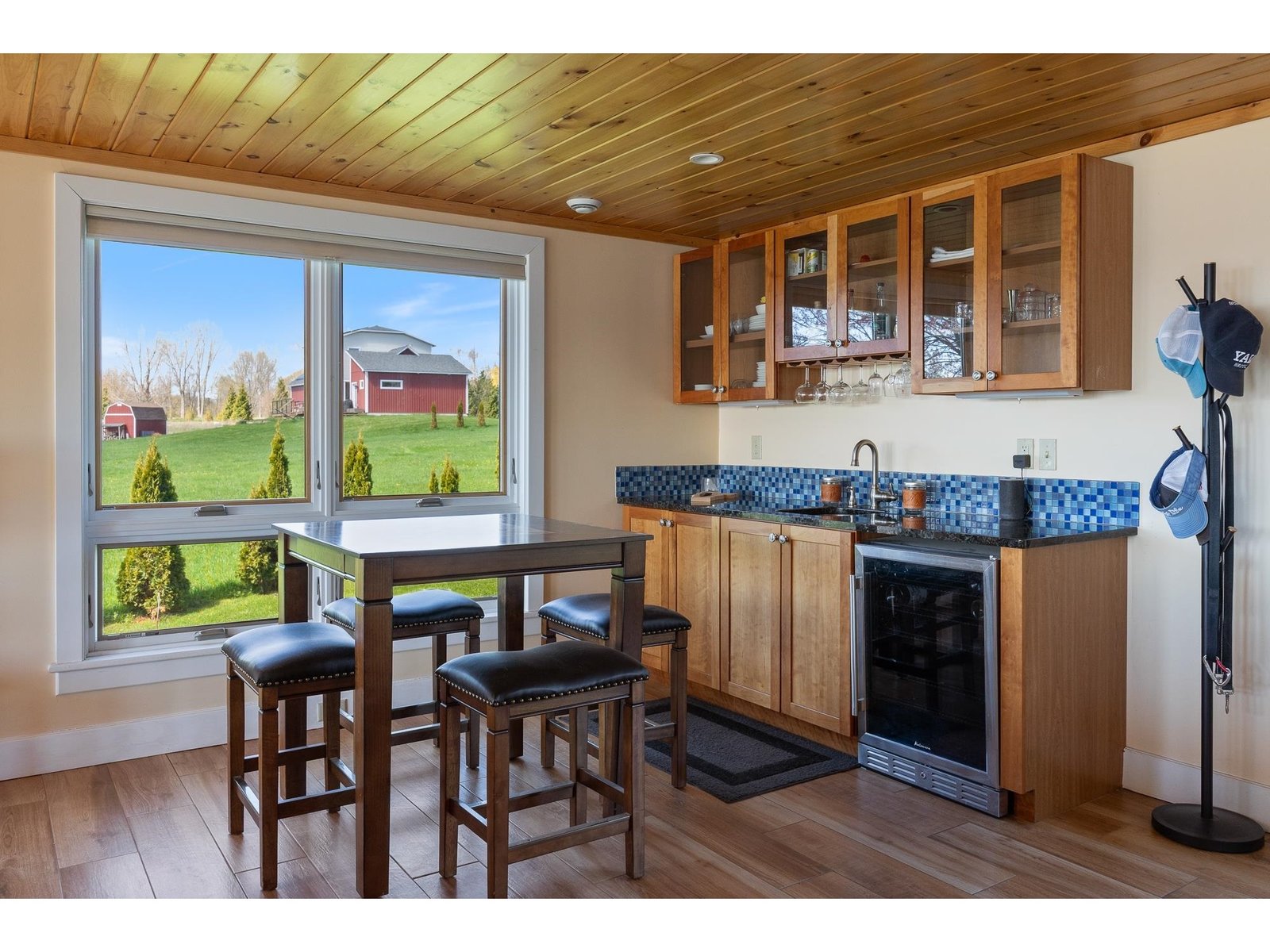 Wet bar with wine refrigerator in living room