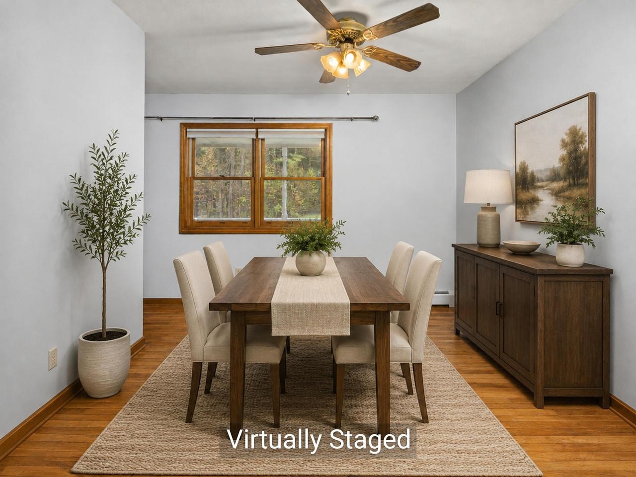 Dining with hardwood floor
