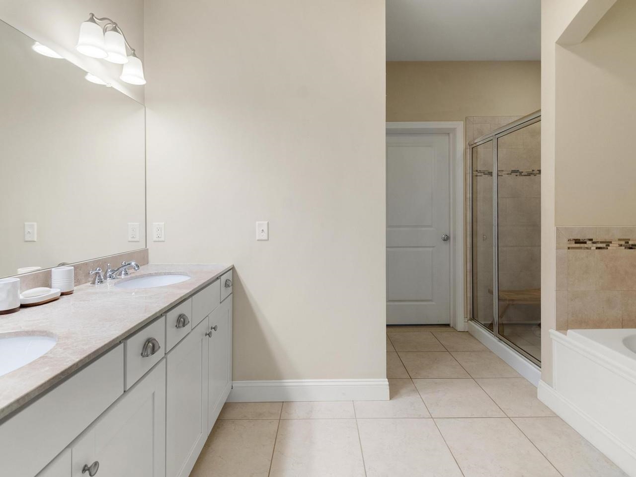 Dual vanity and walk-in closet