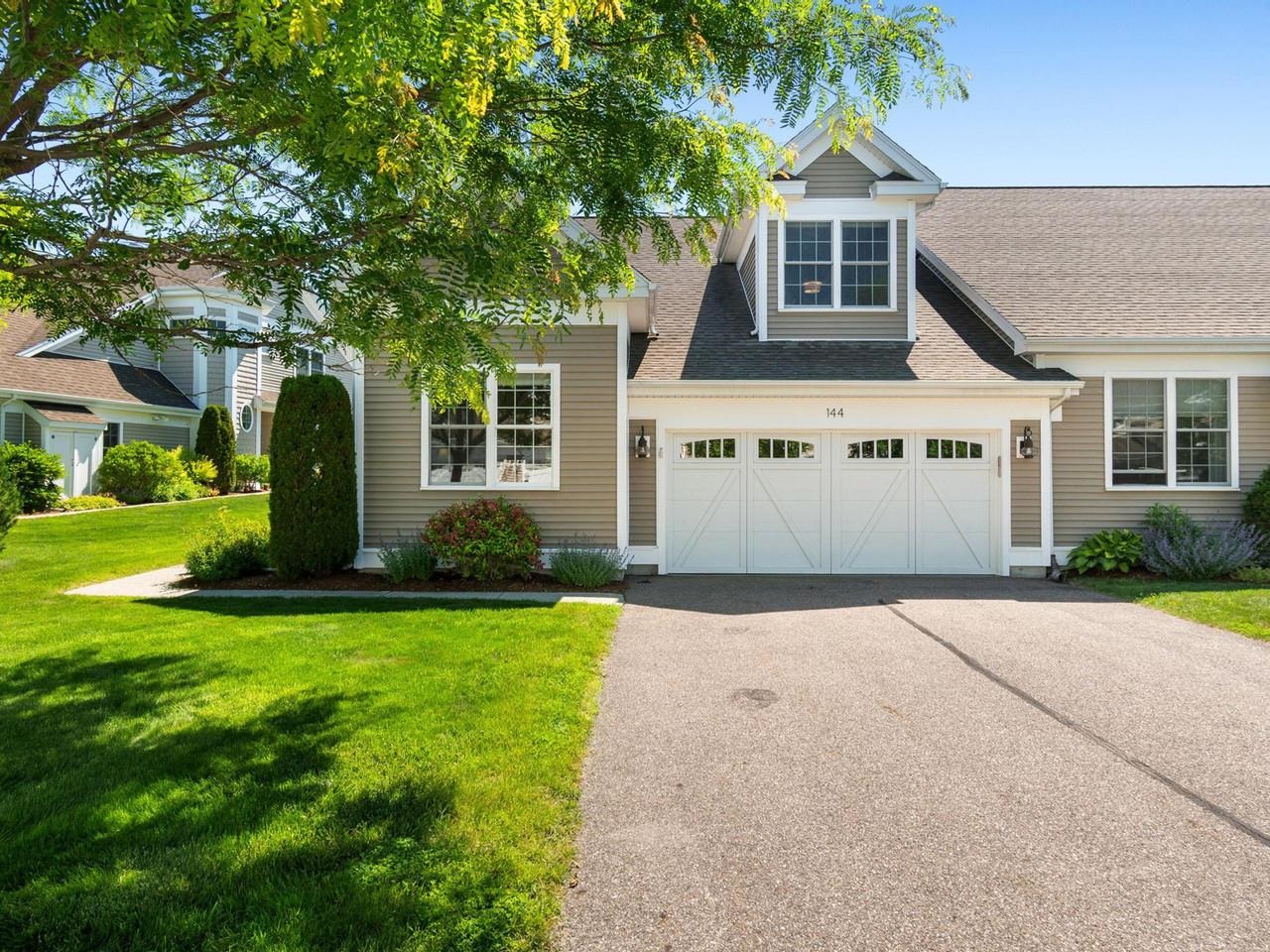Spacious driveway & lush lawn
