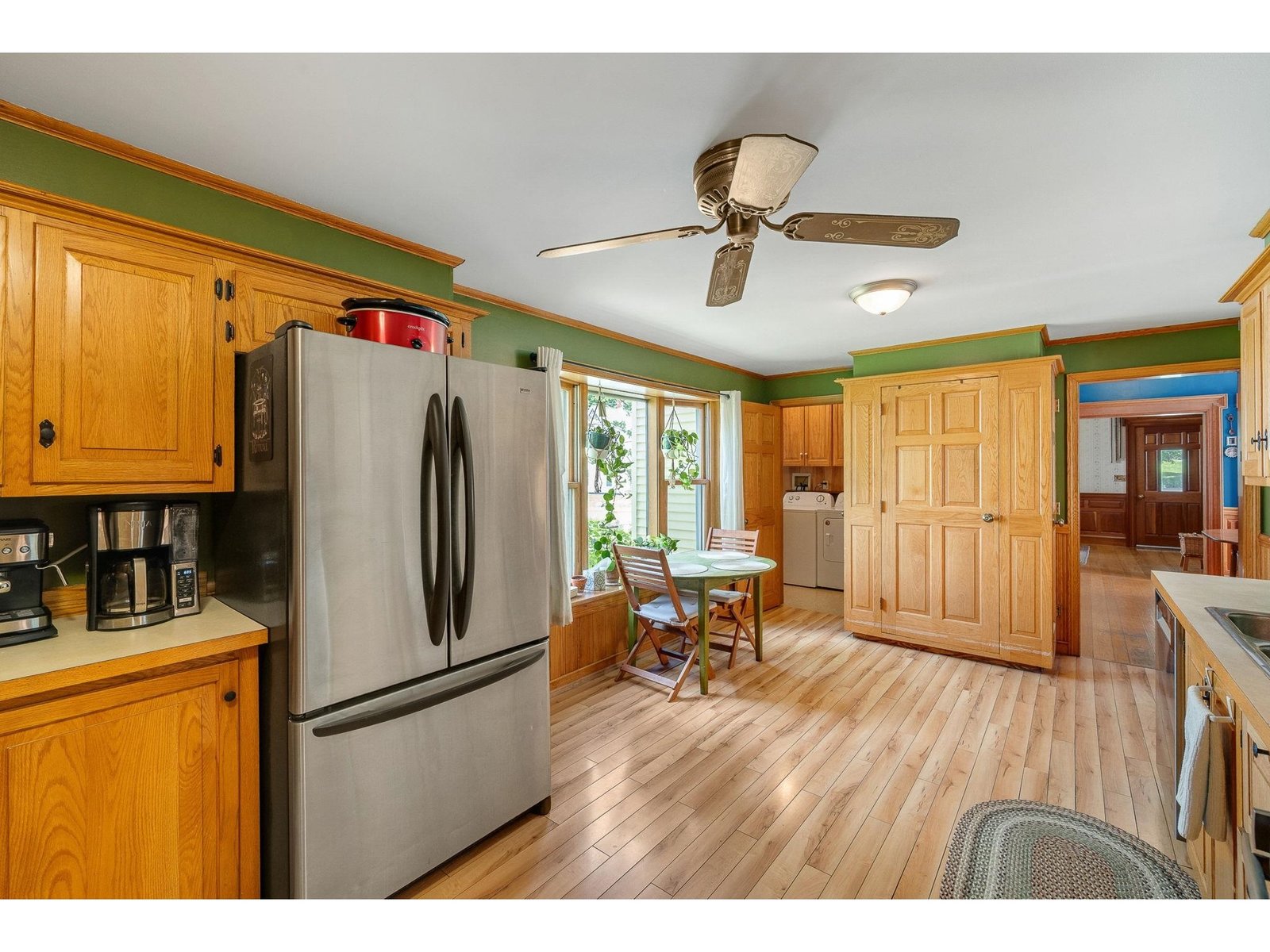 Handmade hardwood cabinetry throughout the kitchen