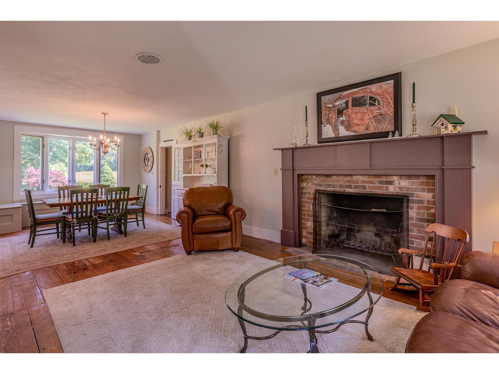 Living room with wood burning fireplace