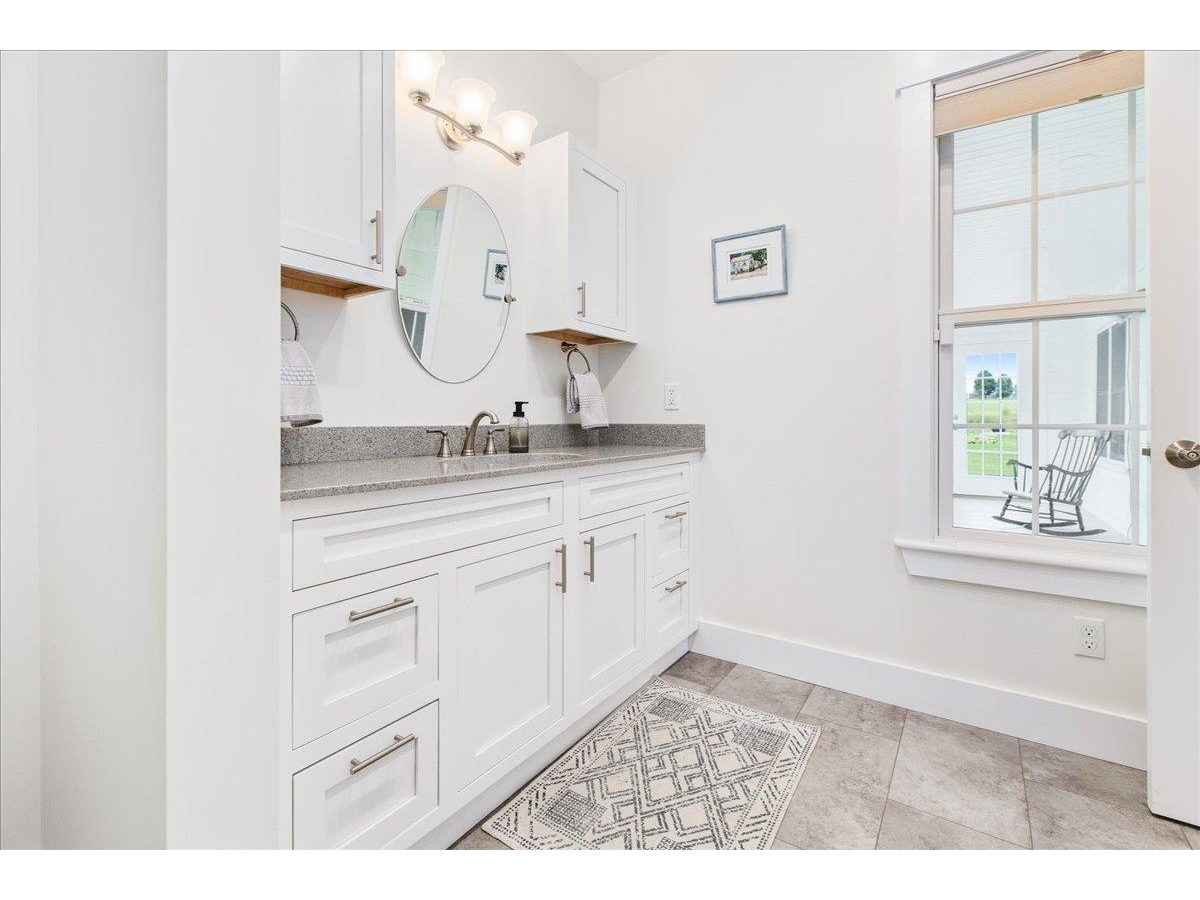 full bath on first floor off foyer, original home