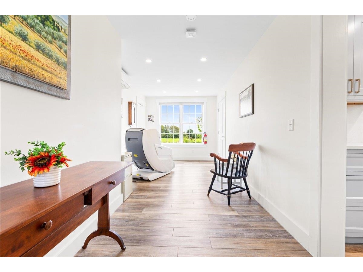 Hallway to garage, exercise room, apartment
