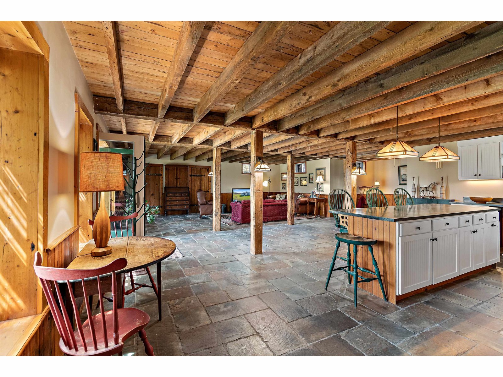 Finished Walkout Basement Featuring Floors Constructed From Vermont Slate Barn Roof