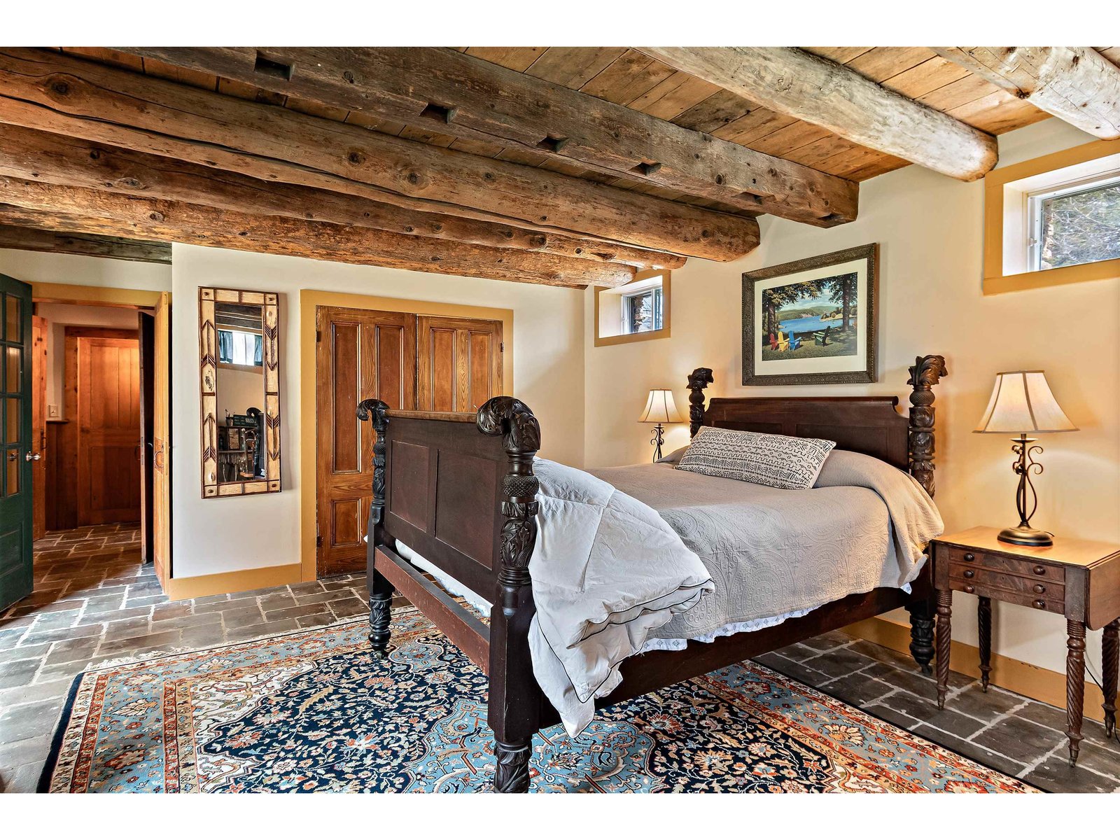 Basement: Bedroom Four Featuring Grain-Painted Closet Doors