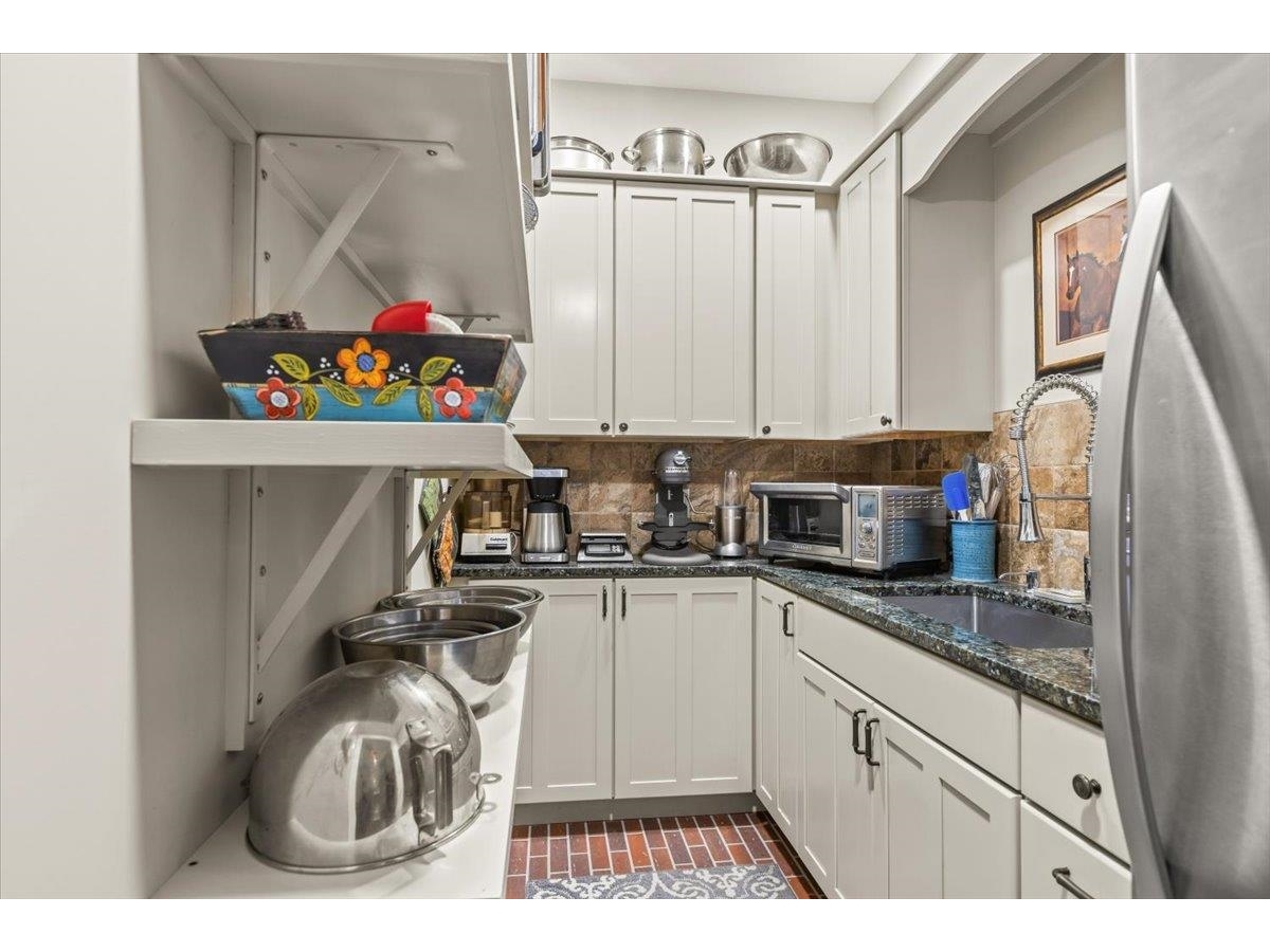 large pantry room with second fridge