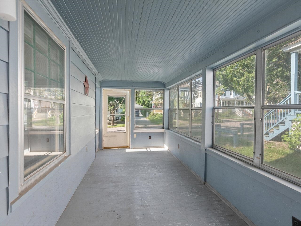 Enjoy the huge enclosed porch