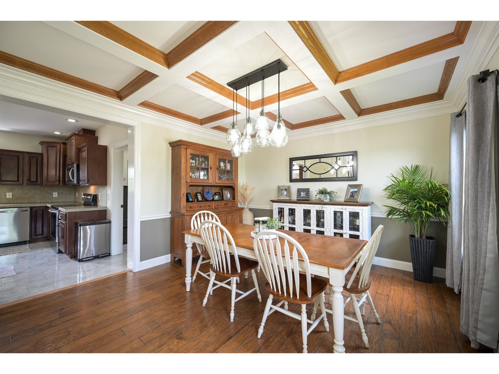 Formal Dining Room with coffered ceiling