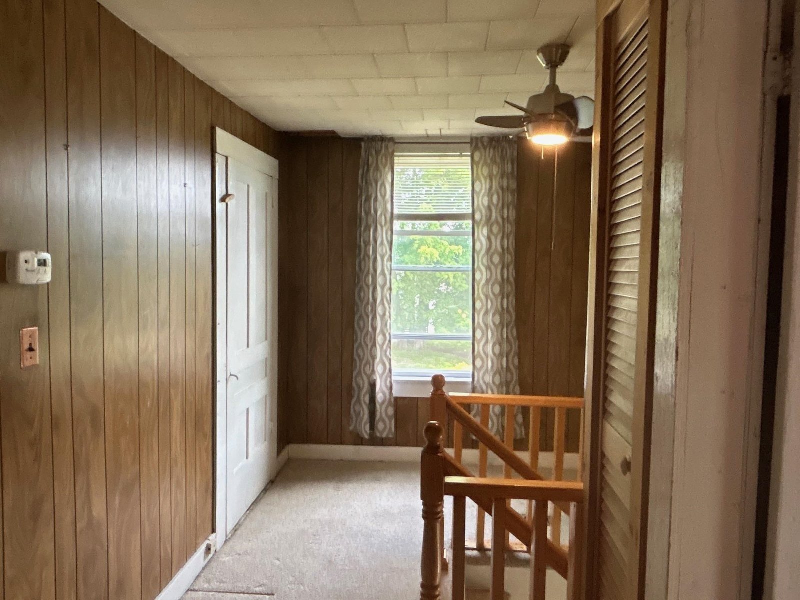 Closets abound and attic door to left