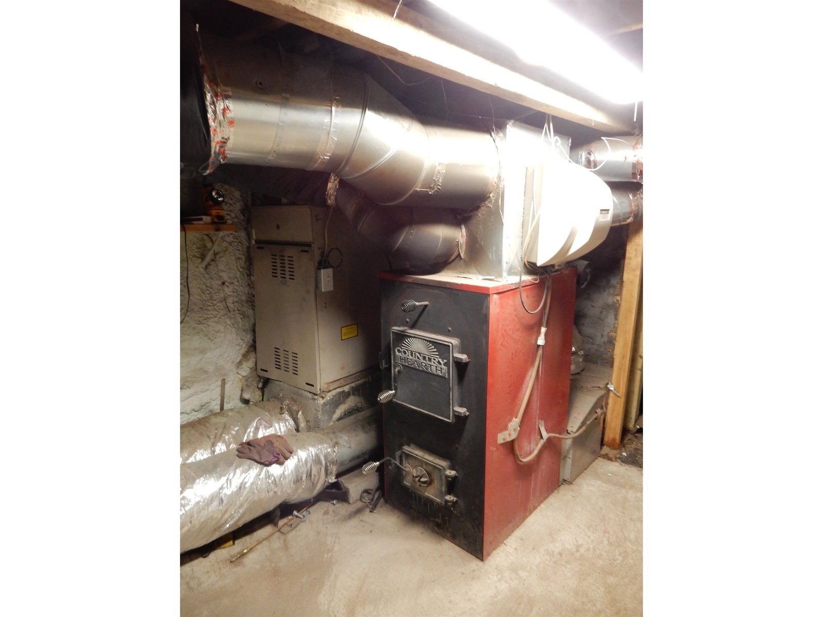Propane direct vented and wood furnace separate chimney