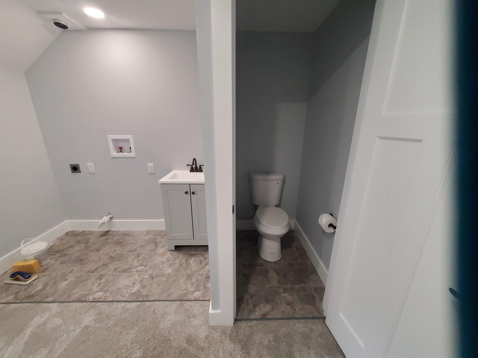 Laundry & 1/4 Bathroom
