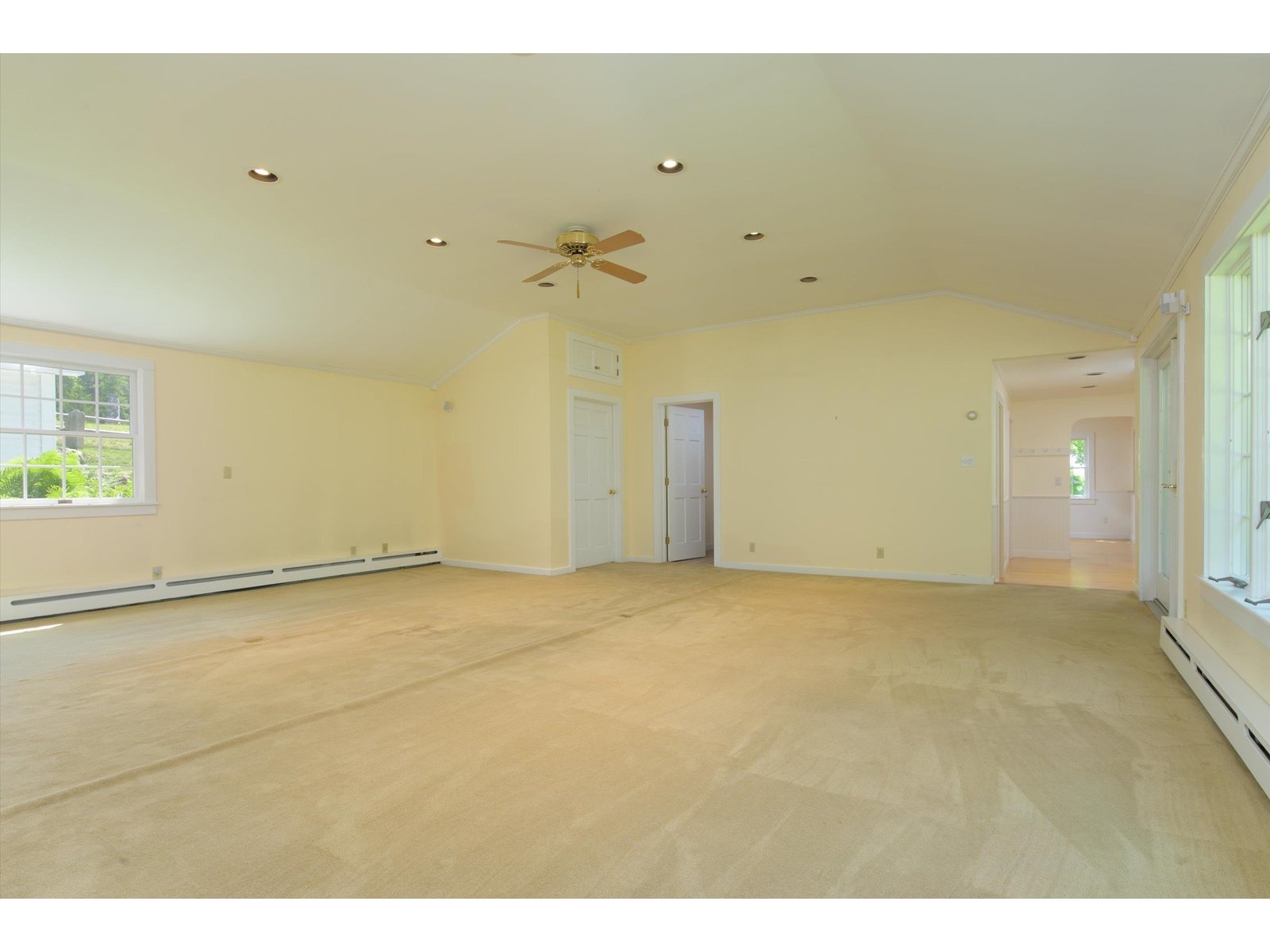Large Living Room Leads to Primary Suite