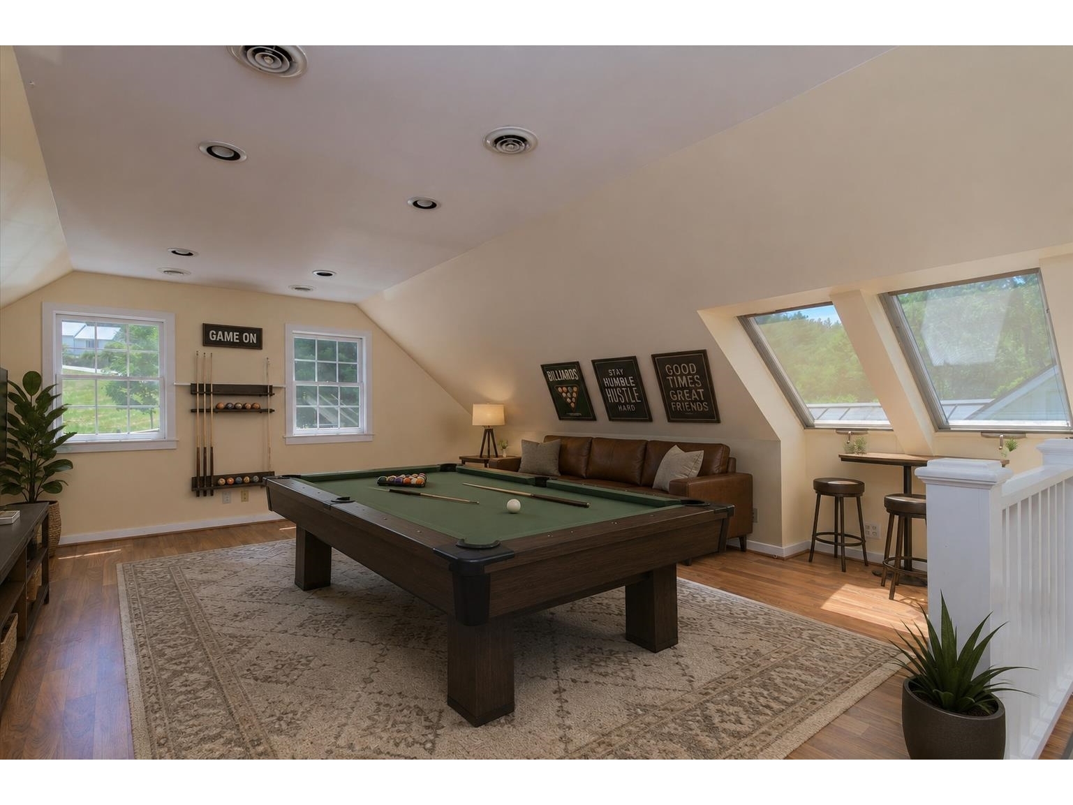 Virtual Staged- Rec room Over the Garage
