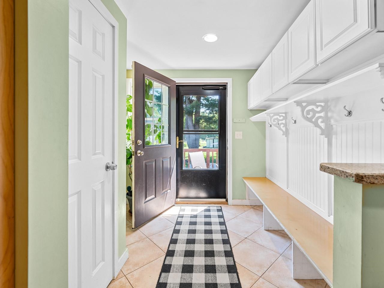 Bright mudroom with built-ins