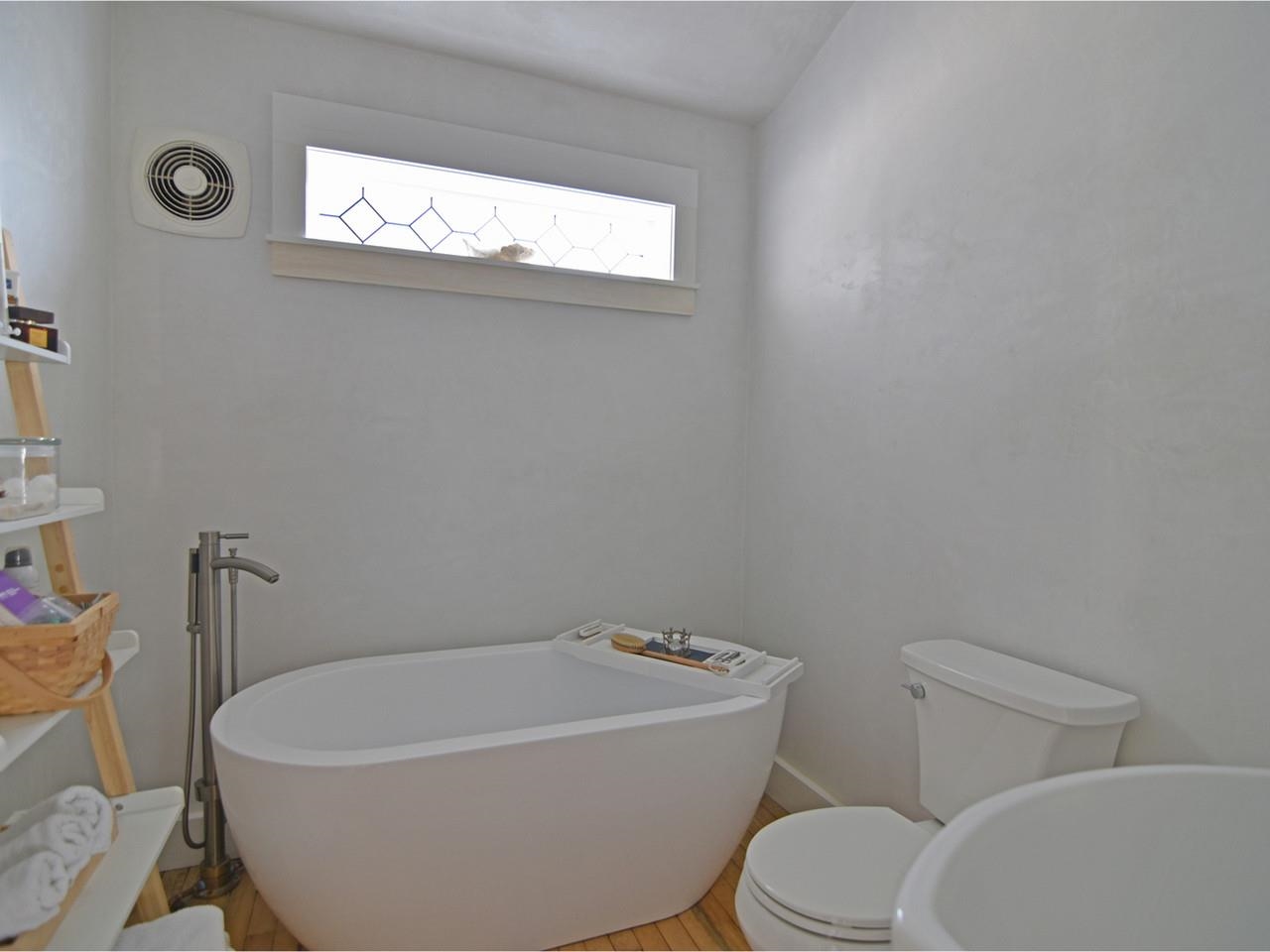 Bath with soaking tub