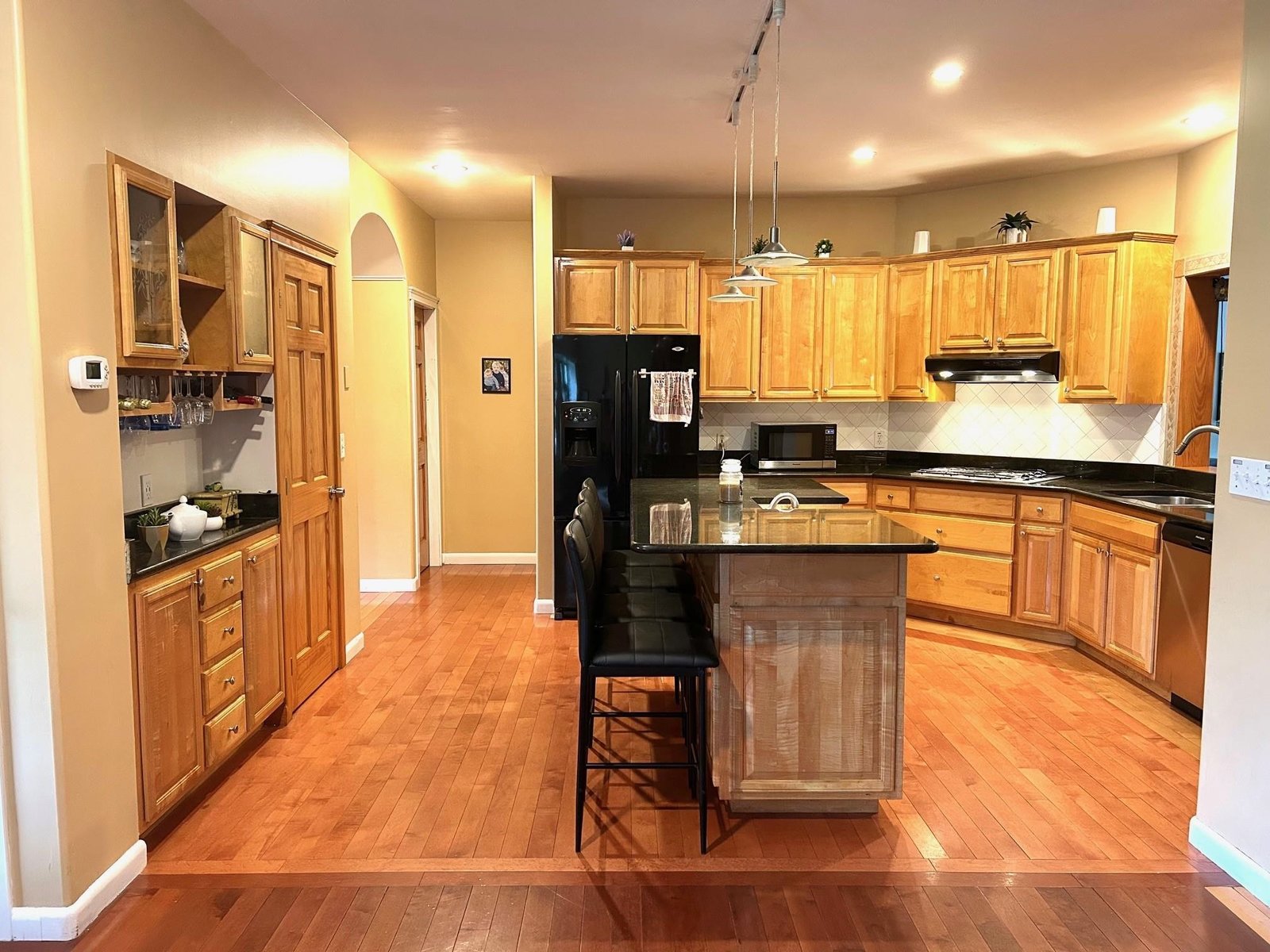 Coffee/beverage bar & WIC/pantry for easy entertaining.