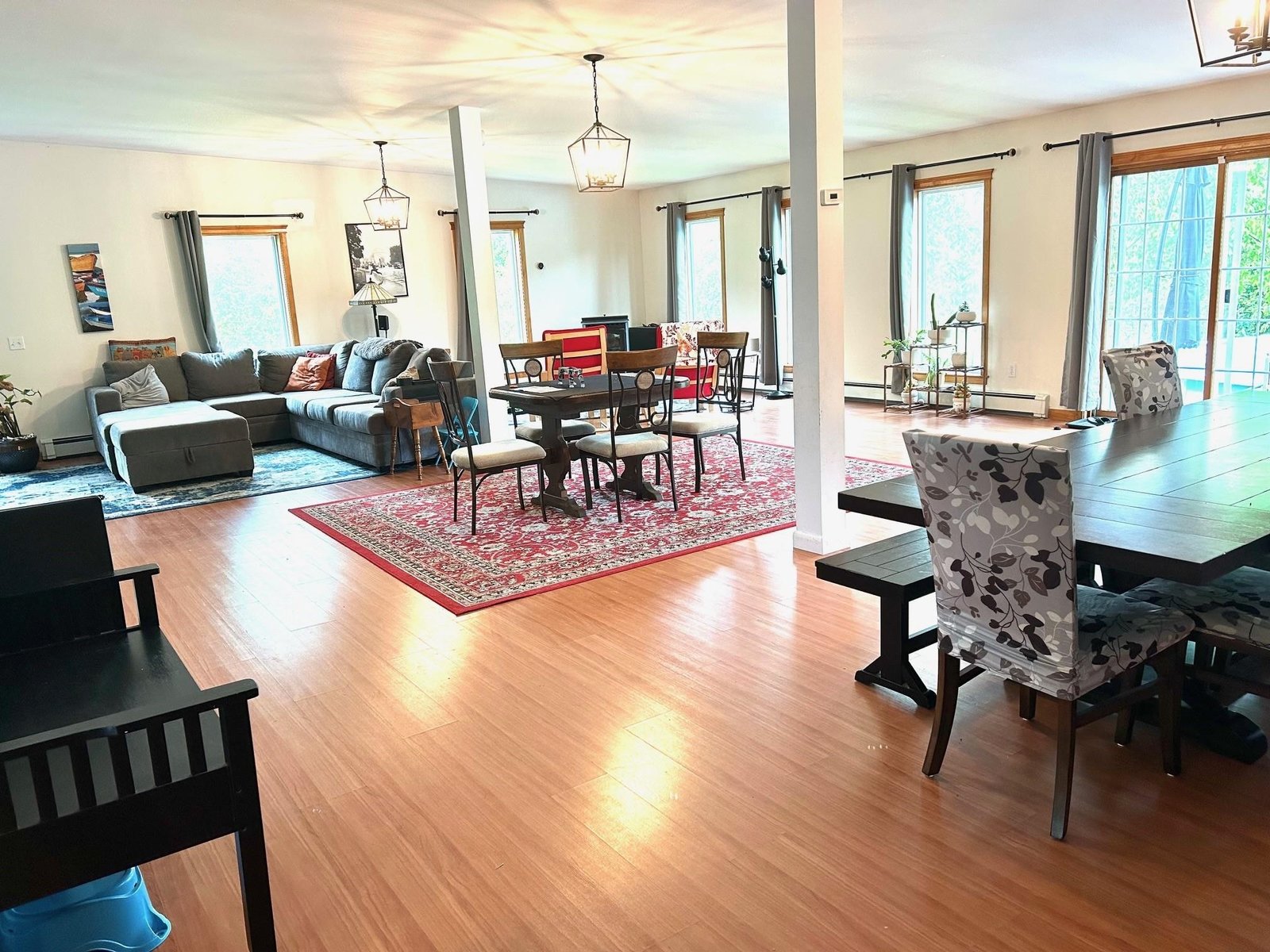 Family room leads to deck and pool area for family fun.