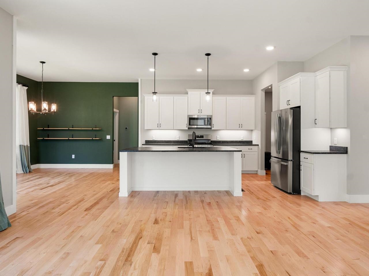 Spacious kitchen with bar