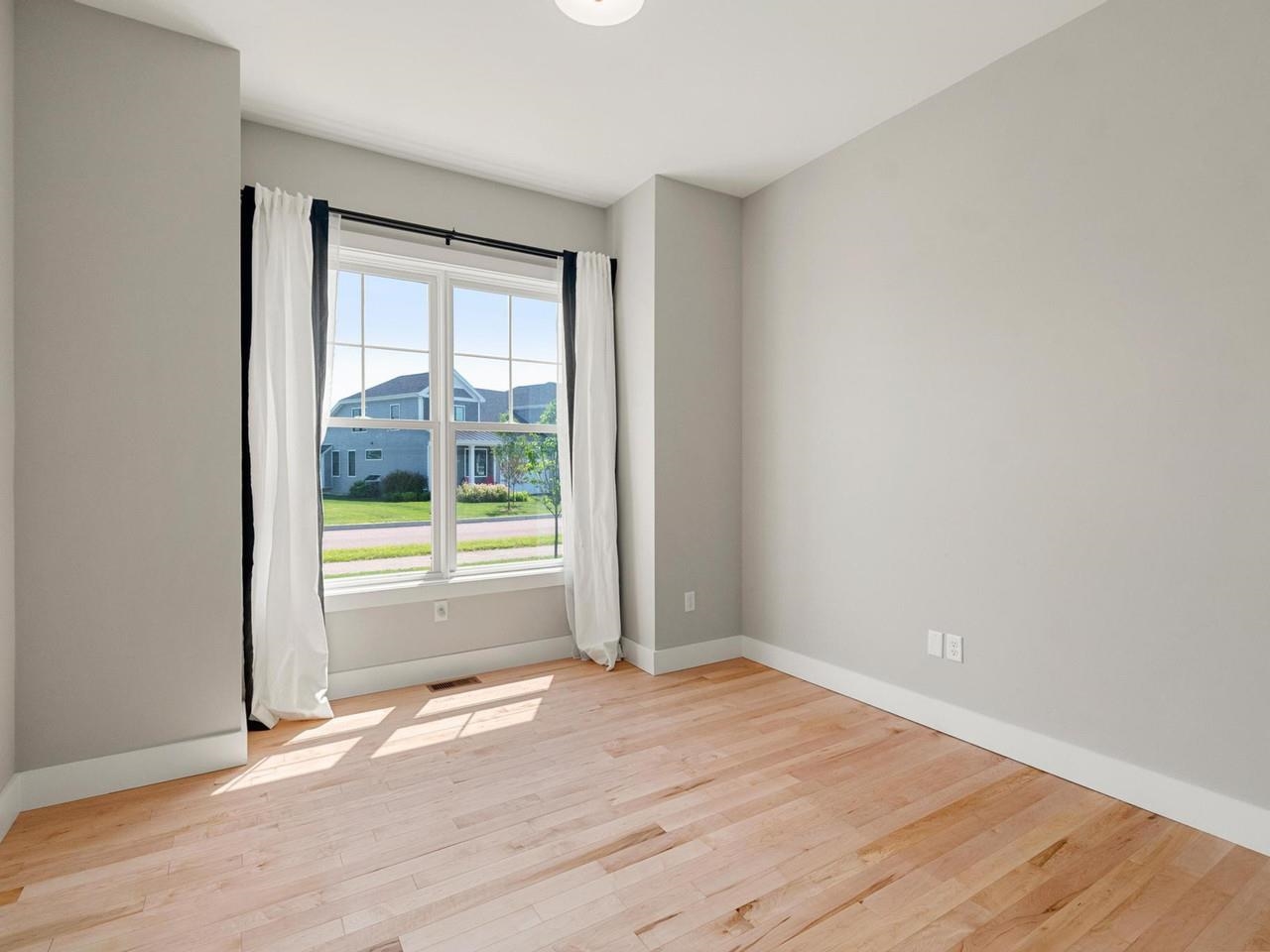 Guest bedroom w/ large window