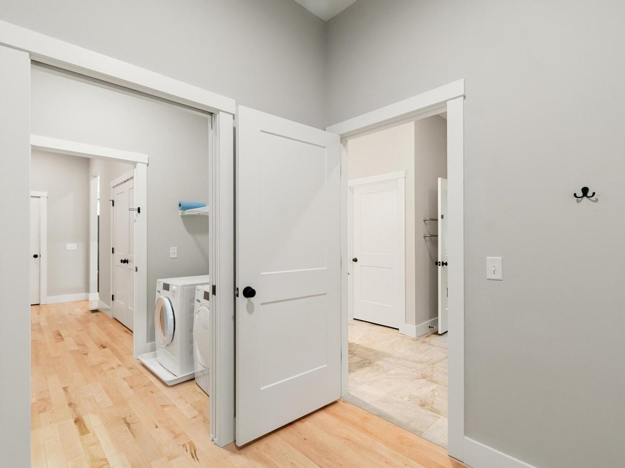Laundry nook with light floors
