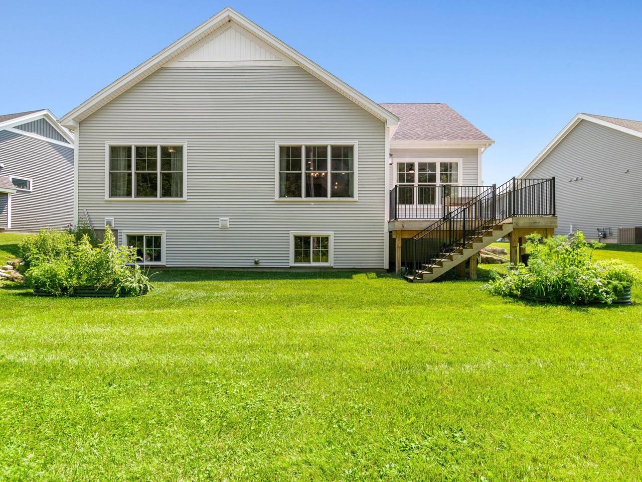 Backyard with sunny lawn
