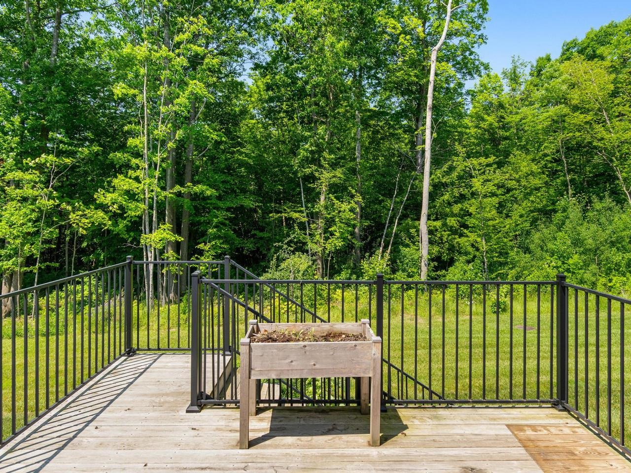 Deck with woodland views
